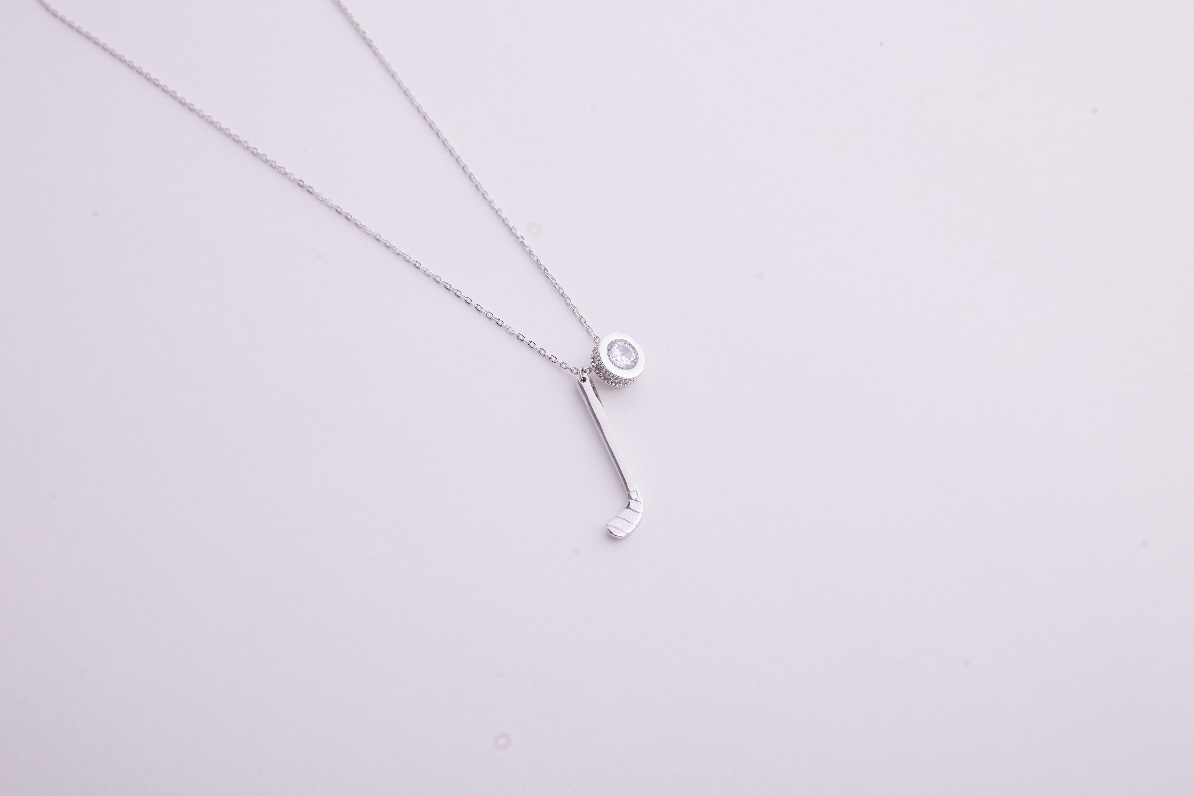 KHAOS "Ice Hockey" Stick Pendant Necklace – S925 Sterling Silver with Zircon Accent