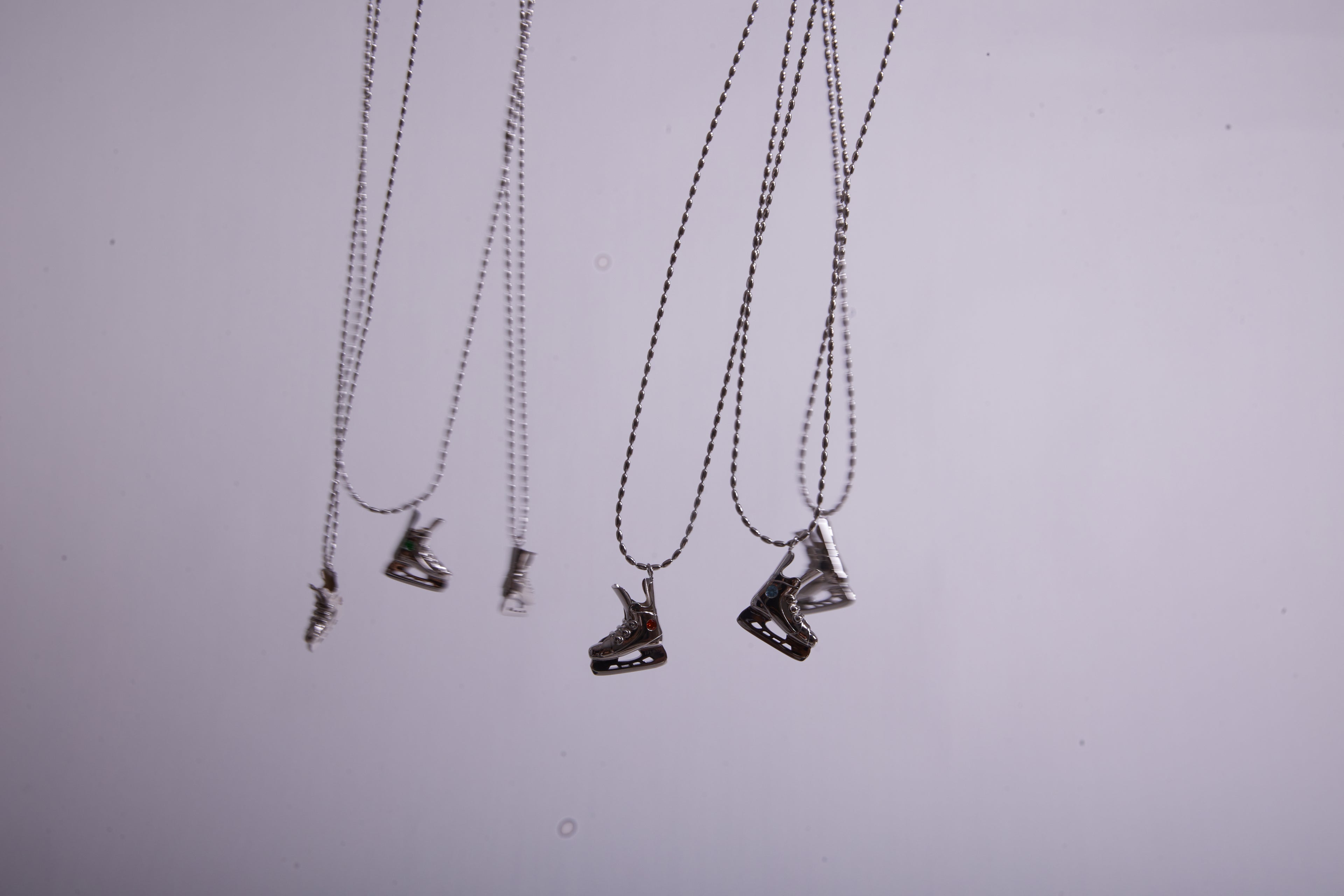 KHAOS "Ice Hockey" Skate Pendant Necklace – S925 Sterling Silver with Zircon Accents